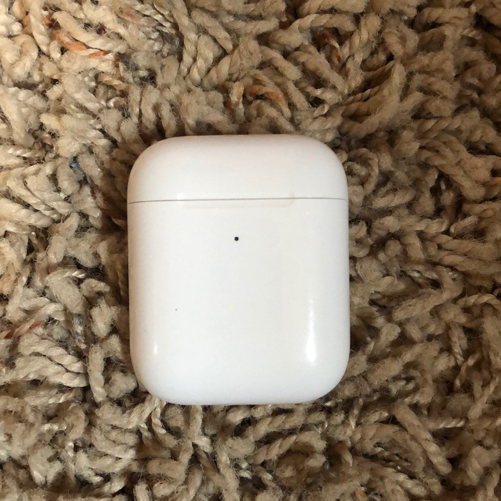Left AirPod and case